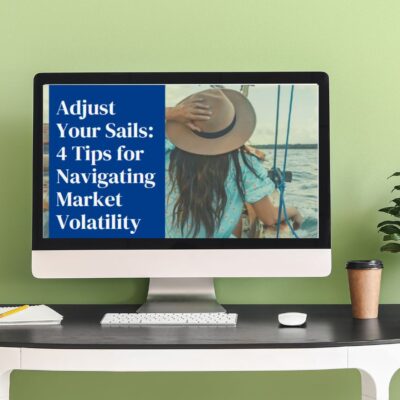 a computer on a desk with text on the screen adjust your sails 4 tips for navigating market volatility